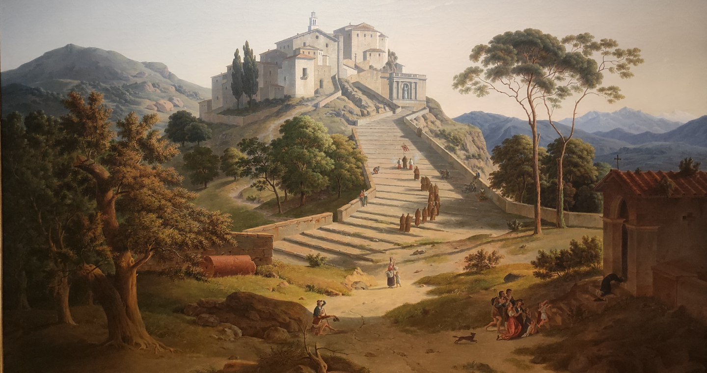 Suggestive view of the tenth chapel of Sacro Monte di Varese, with the arch in the foreground, reflecting the artistic and spiritual beauty of this UNESCO site