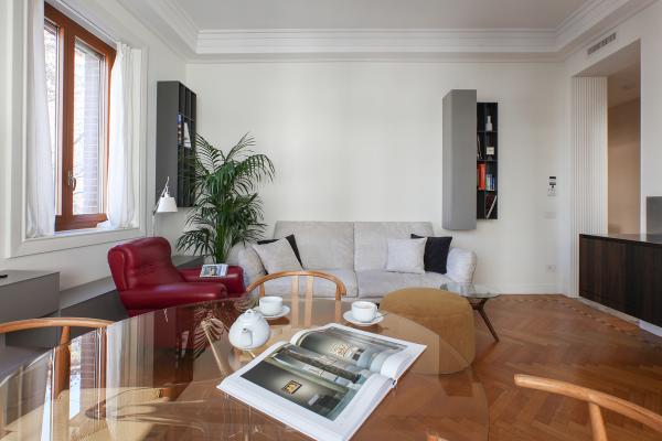 Experience the timeless charm of this spacious 80-square-meter (861 sq ft) 1930s luxury apartment in downtown Milan, fully renovated in 2024 to blend original period details with sleek contemporary Italian design